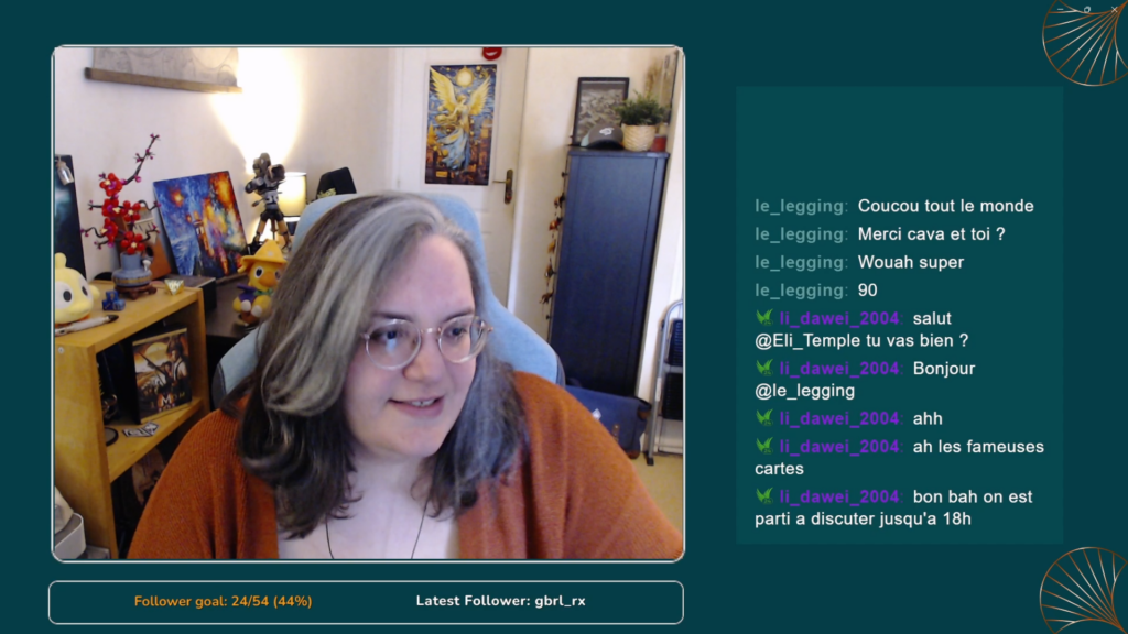 Photo d'un live Twitch, avec caméra sur Eli Temple et le chat de discussion.